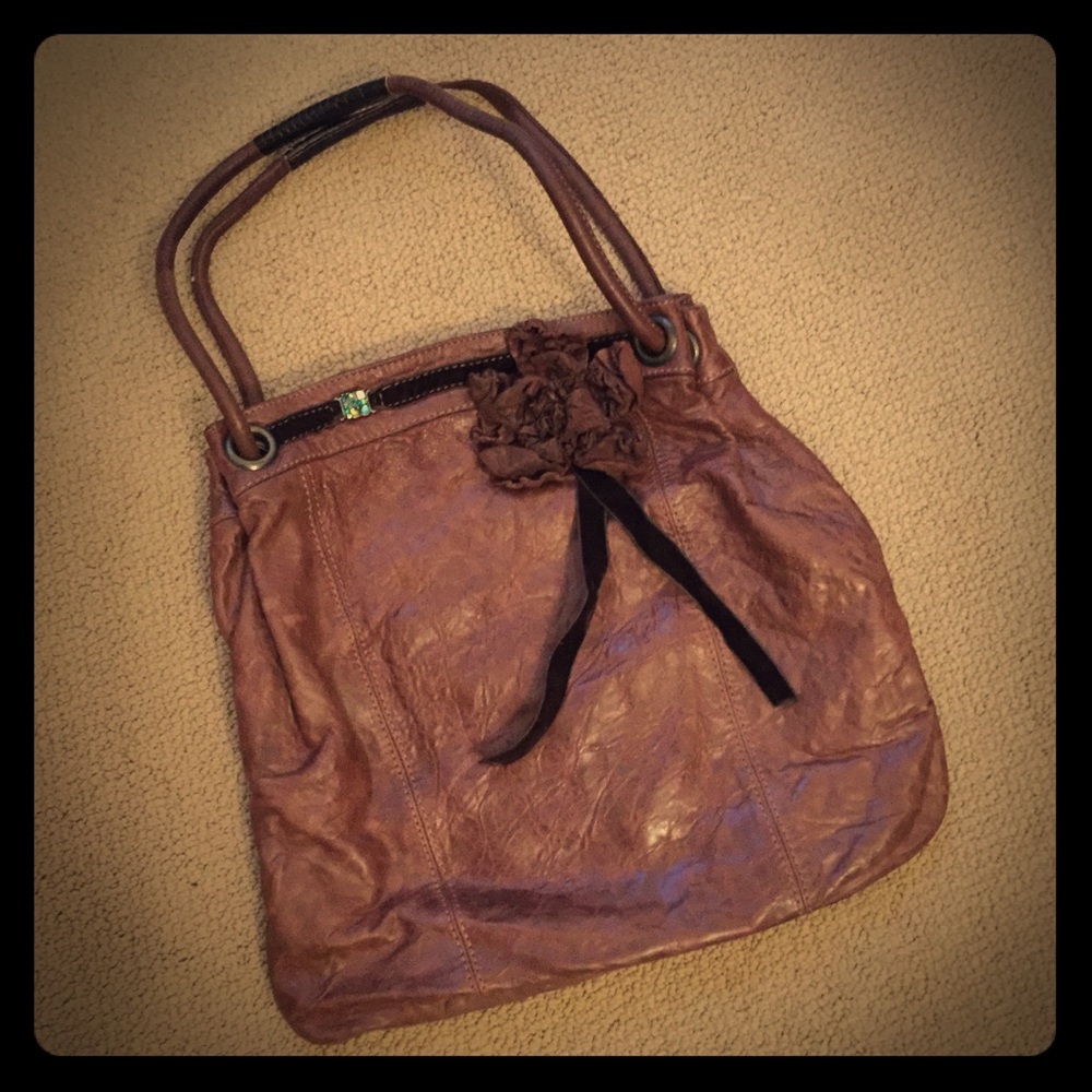 Leather purse with velvet & jeweled details.